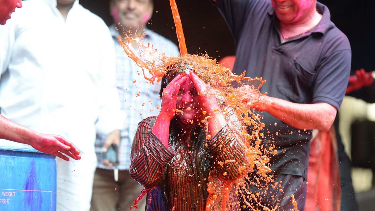 Hyderabad: People doused each other in colour and dumped buckets full of water. Credit: AFP Photo