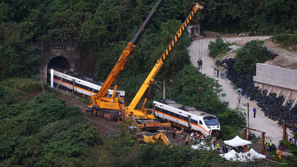 Rescuers work at the site a day after a deadly train derailment at a tunnel north of Hualien, Taiwan. Credit: Reuters Photo