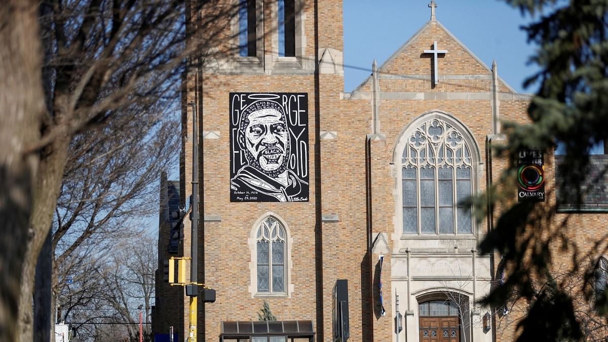 An artistic drawing of George Floyd is seen on the facade of Calvary Lutheran Church near George Floyd Square, after the fifth day of the trial for Derek Chauvin, who is facing murder charges in the death of George Floyd, in Minneapolis, Minnesota, US. Credit: Reuters Photo