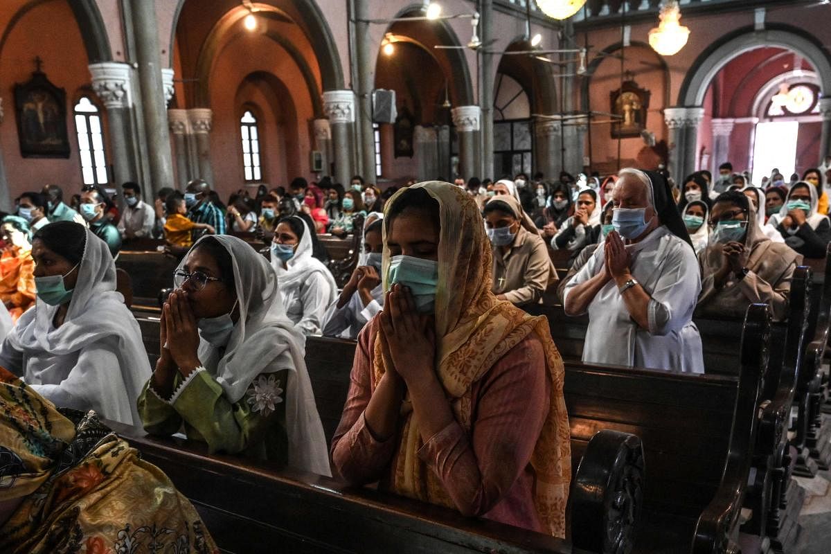 Christians devotees attend an Easter mass at the Sacred Heart Cathedral in Lahore on April 4, 2021.| AFP Photo