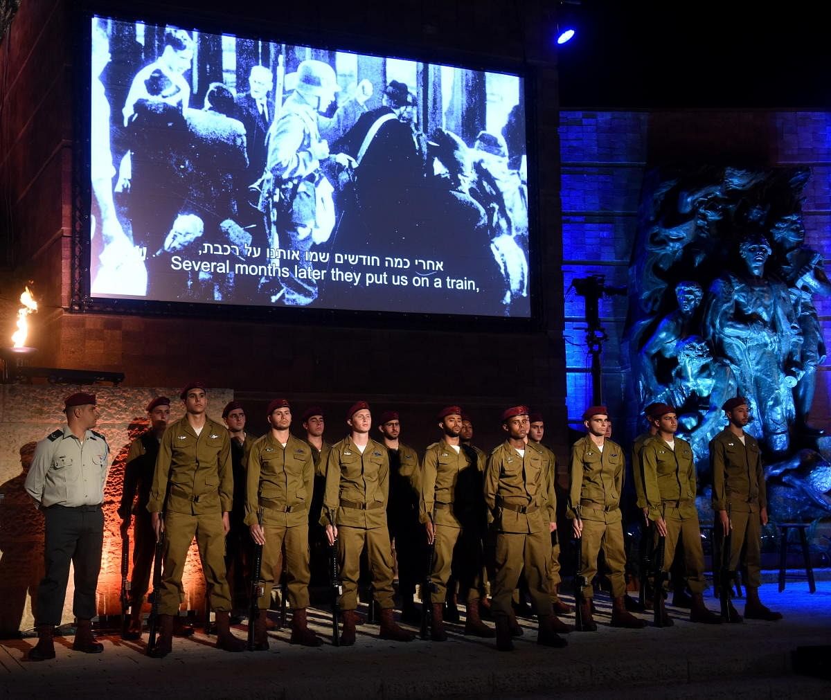 Israeli soldiers stand at the Holocaust Martyrs' and Heroes Remembrance Day opening ceremony in memory of the six million Jewish men, women and children murdered by the Nazis and their collaborators, at Yad Vashem Holocaust Museum in Jerusalem. Credit: Reuters Photo