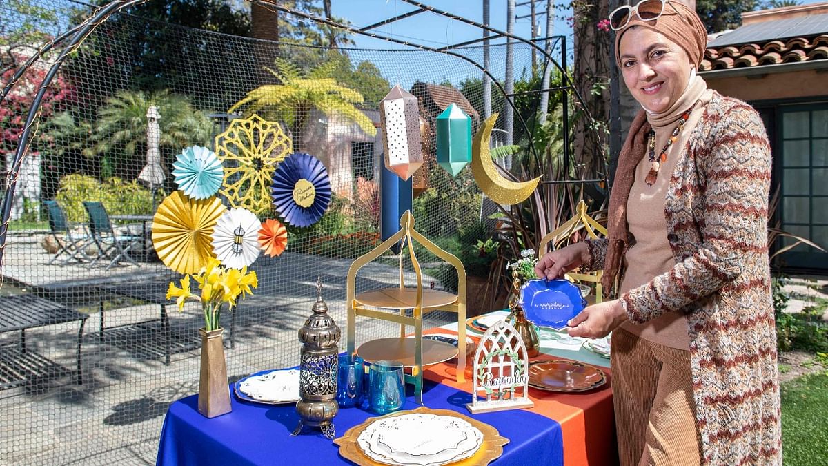Lebanese-American Designer and owner of Eid Creations, Rana Bacaloni poses with the Ramadan and EID decors and gifts she designed, April 9, 2021, in Santa Monica, California. Credit: AFP.