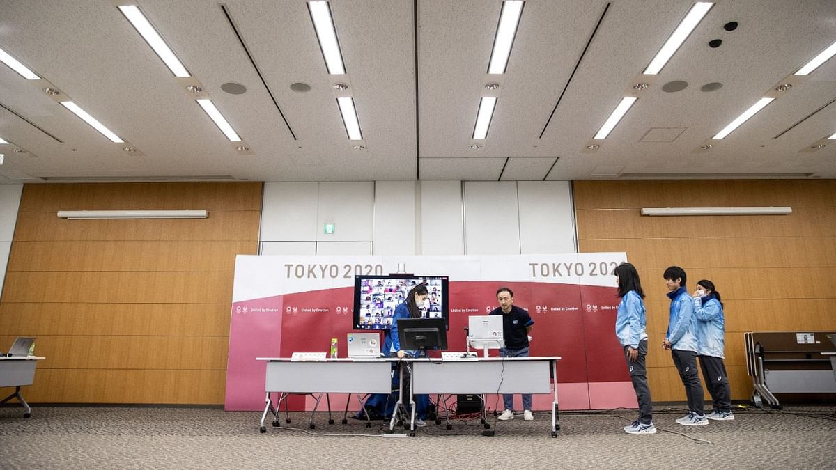 A general view shows the online field cast volunteer training at the Tokyo 2020 headquarters in Tokyo on April 10, 2021. Credit: AFP.