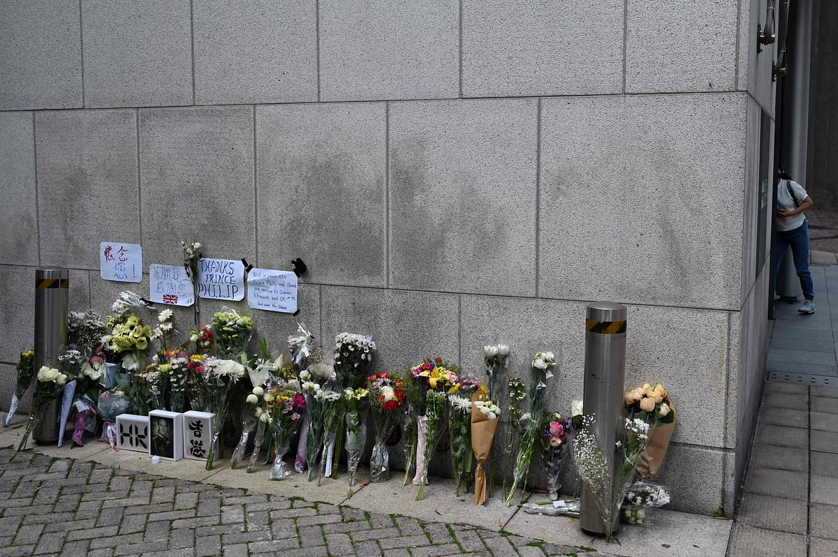 Flowers and tributes are seen outside the British Consulate General in Hong Kong on April 11, 2021, following the death on April 9 of Britain's Prince Philip, the Duke of Edinburgh and husband of Queen Elizabeth II. Credit: AFP Photo