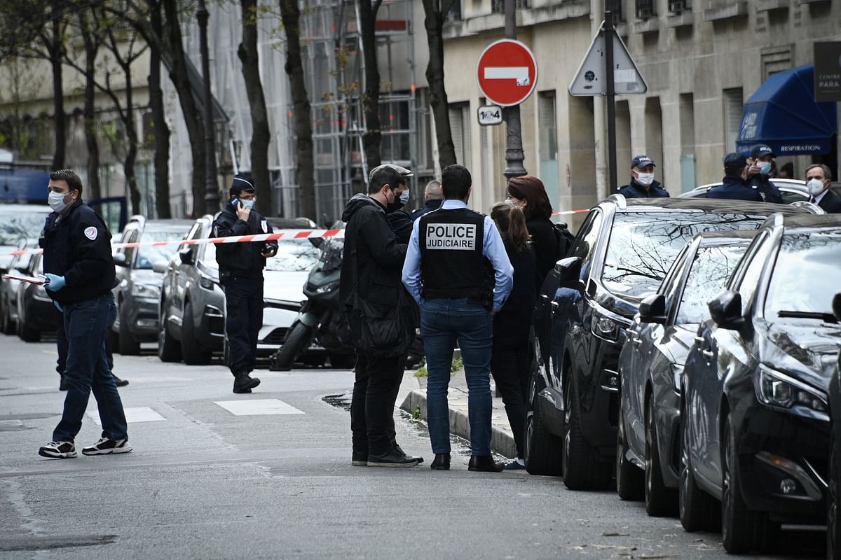 French police police officers stand near the Henry Dunant private hospital where one person was shot dead and one injured in a shooting outside the instituion owned by the Red Cross in Paris' upmarket 16th district. Credit: AFP Photo