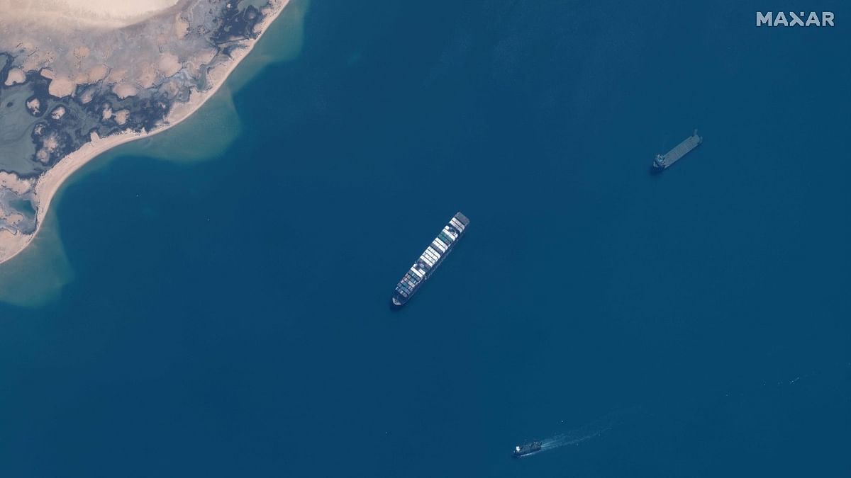 This satellite imagery released by Maxar Technologies shows an overview of the MV Ever Given container ship in the Great Bitter Lake area of the Suez Canal. Credit: AFP photo/Satellite image ©2021 Maxar Technologies