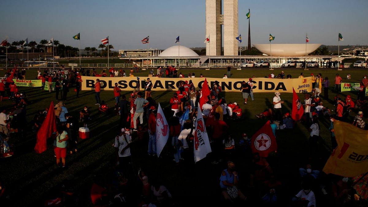 Demonstrators take part in a protest against Brazil's President Jair Bolsonaro in Brasilia, Brazil. Credit: Reuters photo