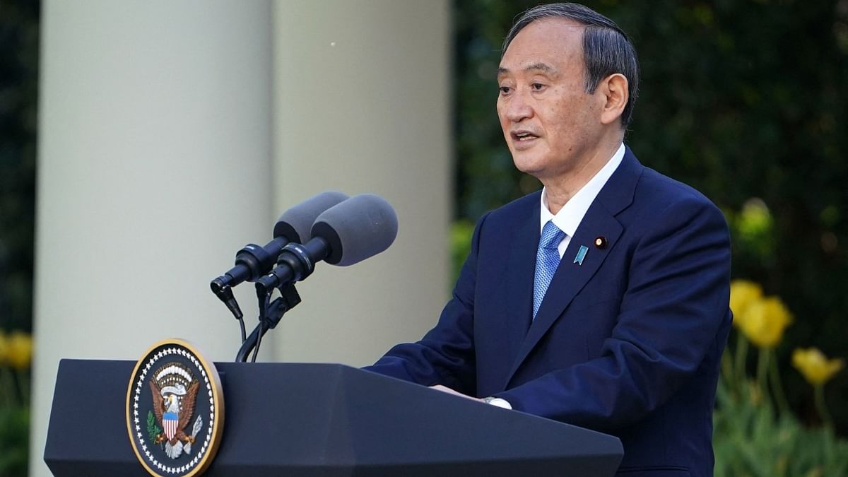 Japan's Prime Minister Yoshihide Suga speaks during a joint press conference with the US president in the Rose Garden of the White House in Washington, DC. Credit: AFP photo
