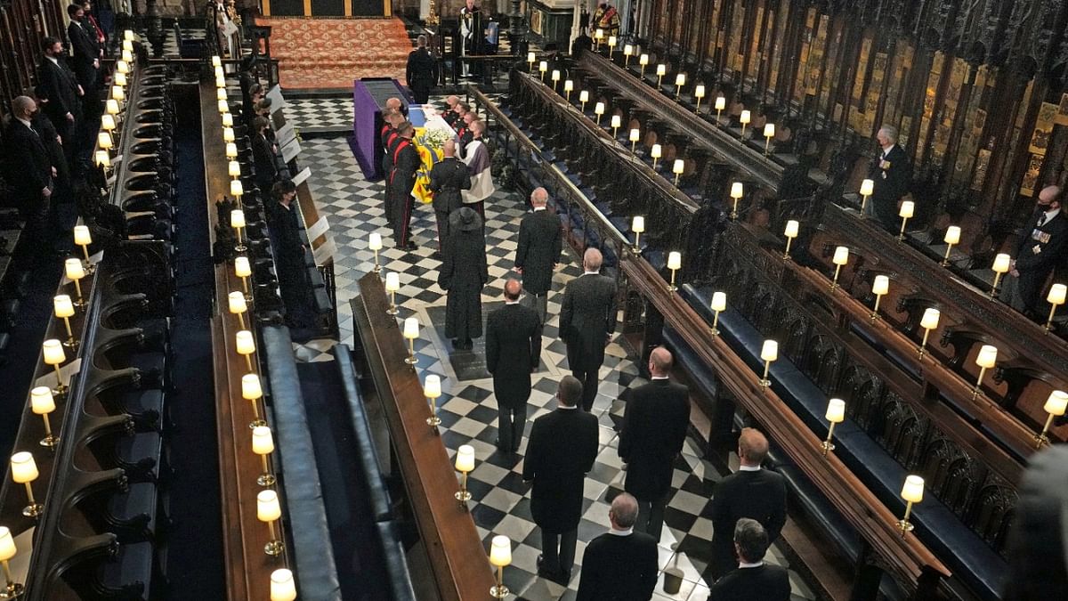 Members of the Royal Family stood behind the coffin of Prince Philip, during his funeral at St George's Chapel in Windsor. Credit: Reuters Photo