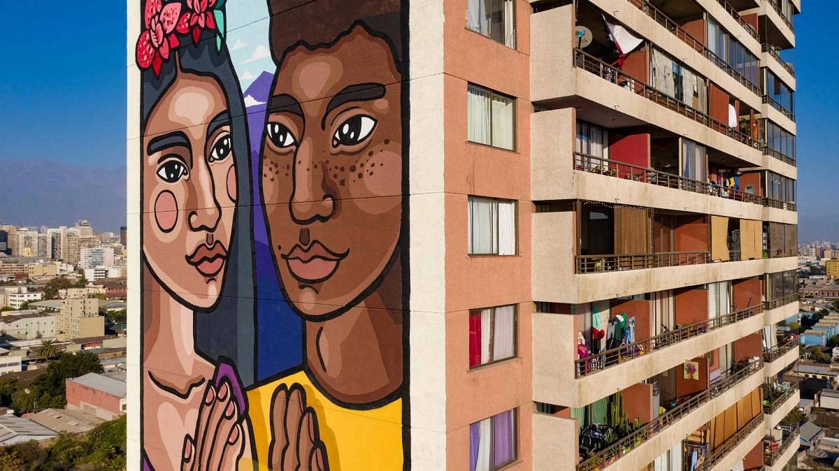 Aerial view of a 60-meter-high mural by Chilean artist STFI Leigthon in a building of the Yungay neighborhood in Santiago. Credit: AFP photo.