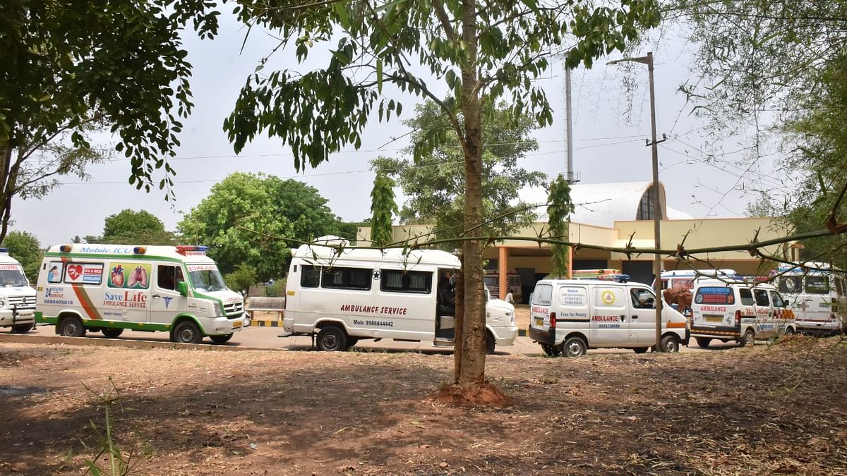 A full fleet of ambulances lined up for hours together outside this crematorium in Medi Agrahara | Credit: DH Photo/Janardhan B K