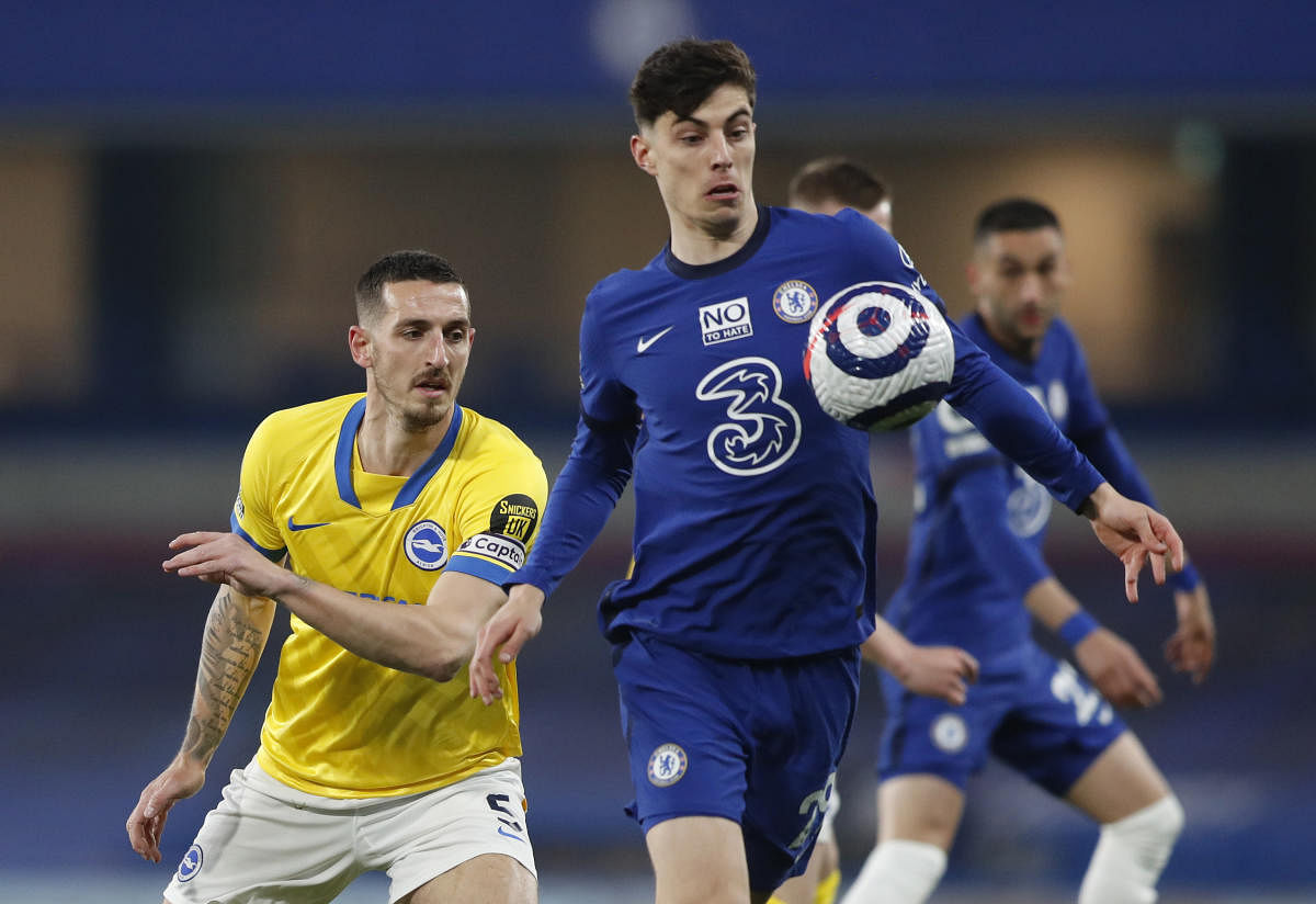 Chelsea's Kai Havertz in action with Brighton & Hove Albion's Lewis Dunk. Credit: Reuters photo.