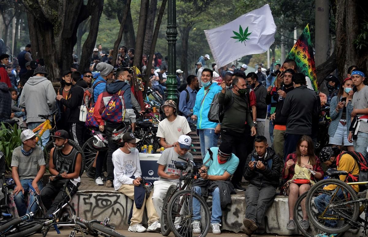 People attend a demonstration demanding the legalization of marijuana for recreational use at the Nacional park in Bogota. Credit: AFP photo.