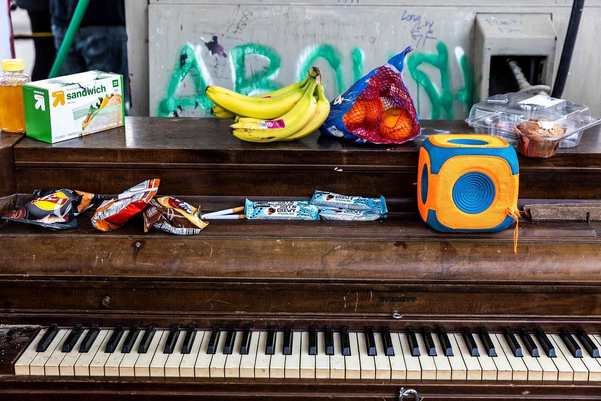 Food is placed on a piano at George Floyd Square in Minneapolis, Minnesota. Credit: AFP photo.
