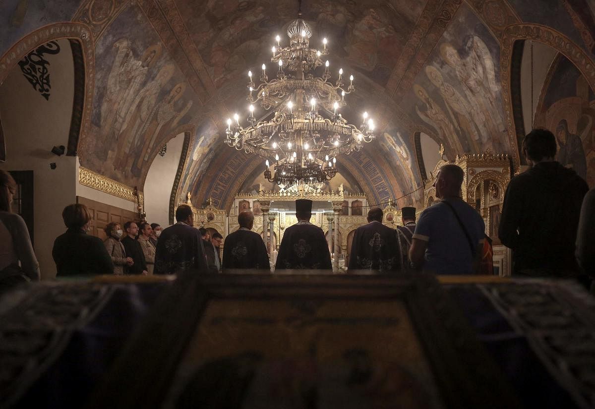 Orthodox priests lead the Good Friday service at Ruzica church in Belgrade, on April 30, 2021. Credit: AFP Photo