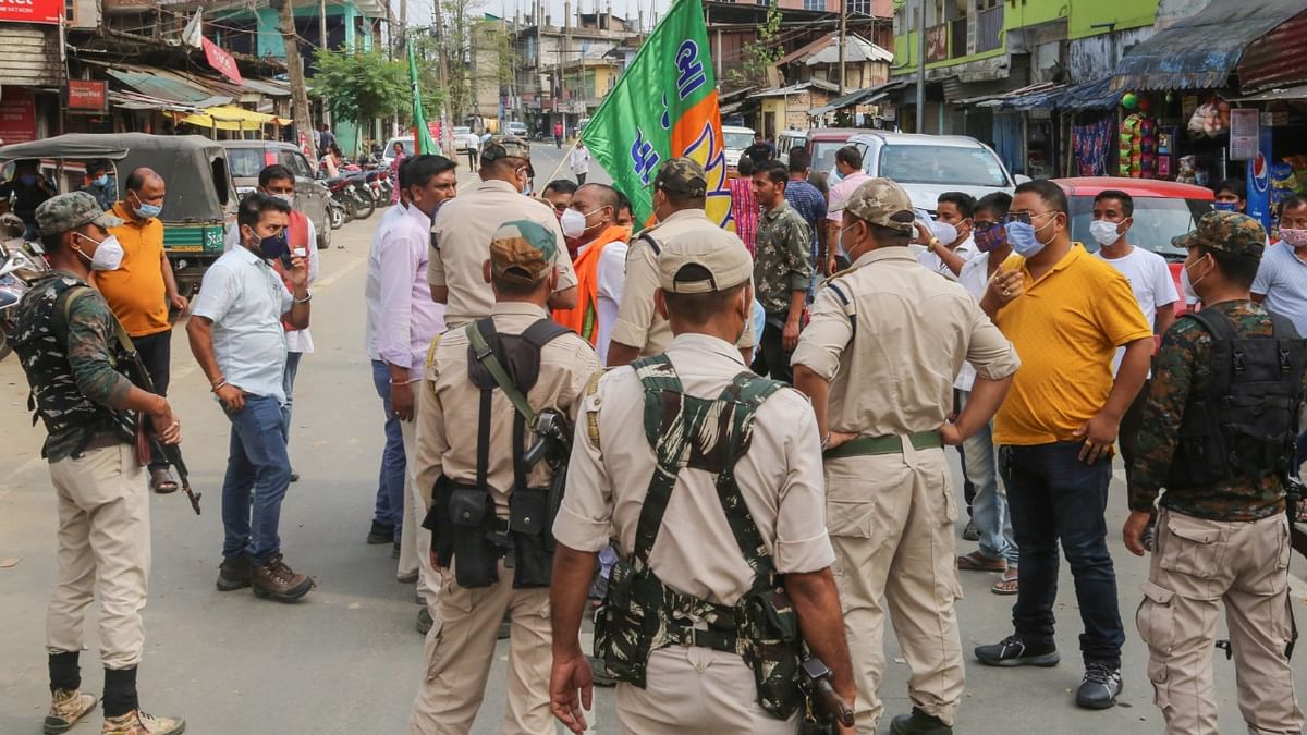 Policemen stop BJP party workers from celebrating poll victory in Assam; See Pics