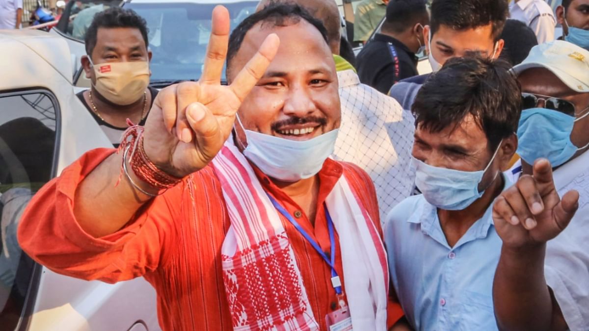 BJP Tinkhong candidate Bimal Bora displays the victory sign as trends show party's win during the counting day of Assam Assembly Poll 2021, in Dibrugarh.