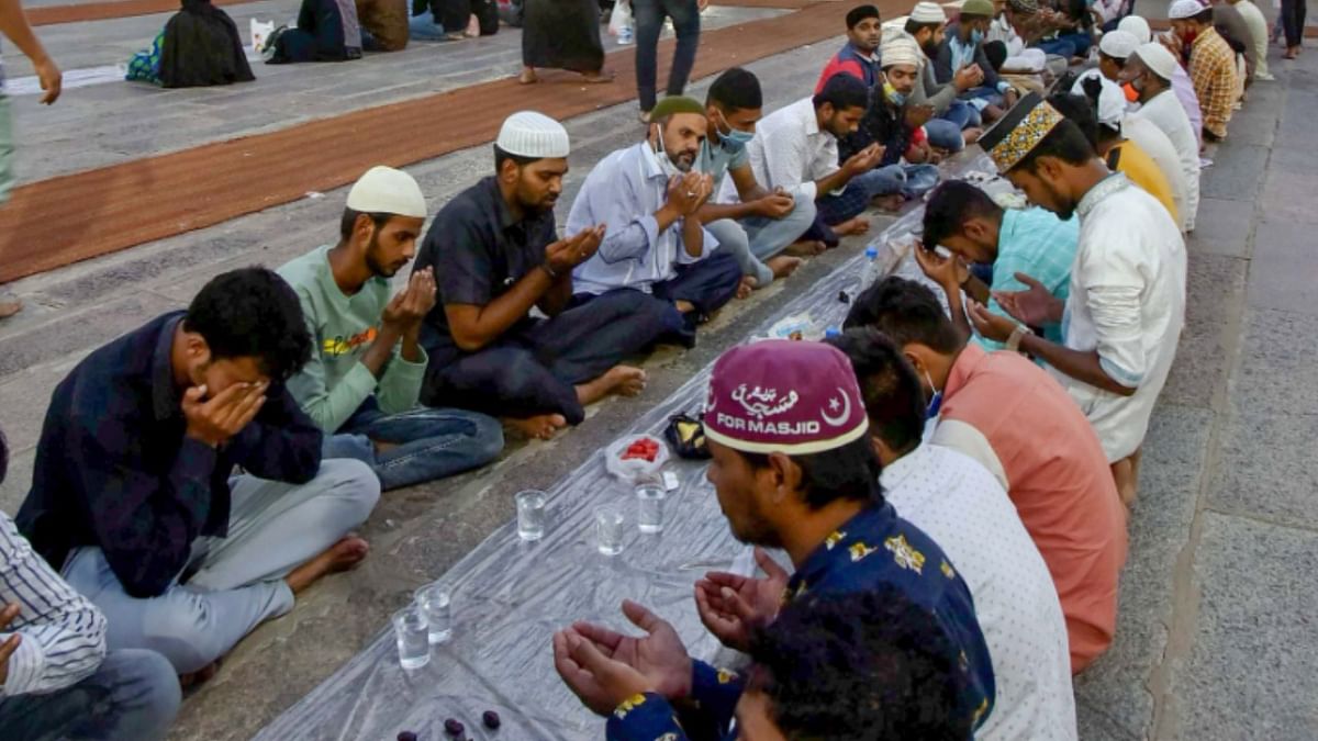 Muslims pray before breaking their day-long fast on the first day of the holy month of Ramzan at Makkah Masjid in old city of Hyderabad. Credit: PTI