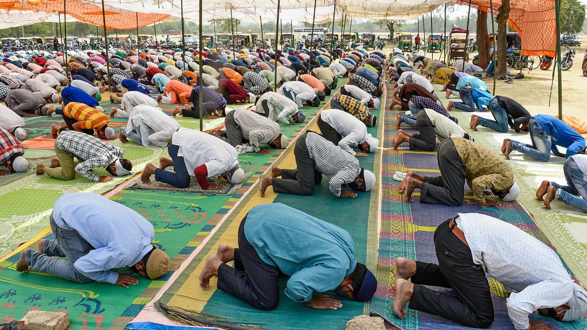 Muslims offer prayers during the ongoing holy fasting month of Ramzan at Leisure Valley Ground in Gurugram. Credit: PTI