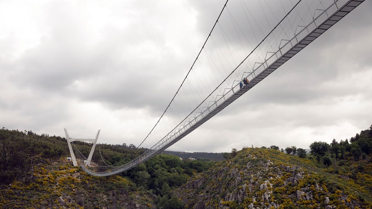 The bridge hangs 175 meters above the fast-flowing River Paiva.