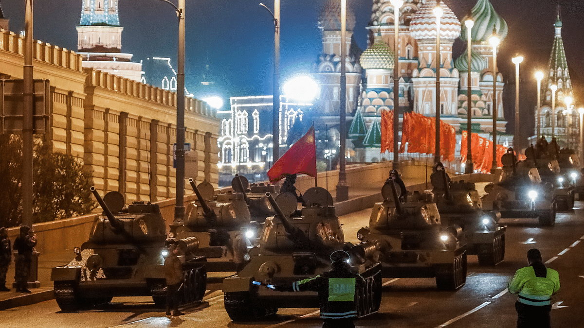 Historical T-34 tanks are seen on a bridge, with St. Basil’s Cathedral behind, after a rehearsal for the Victory Day military parade in Moscow, Russia. Credit: Reuters Photo