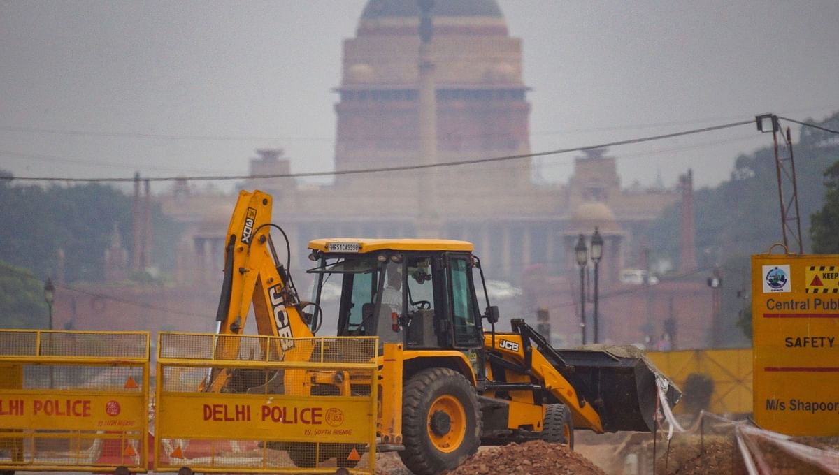 A JCB digger working in the construction site at Rajpath in New Delhi.