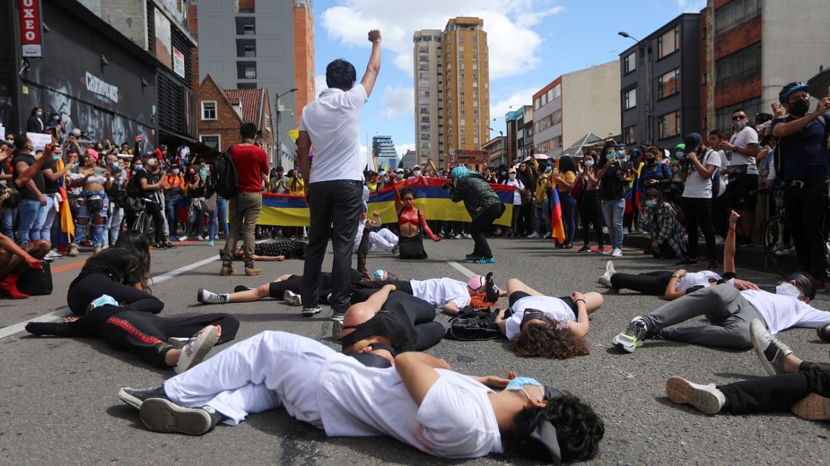 Demonstrators take part in a protest demanding government action to tackle poverty, police violence and inequalities in healthcare and education systems, in Bogota, Colombia. Credit: AFP Photo