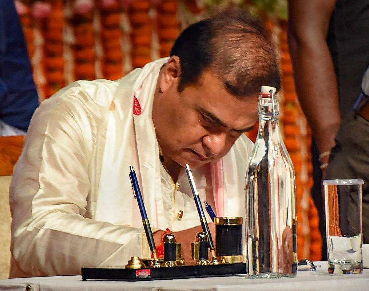 Himanta Biswa Sarma signed the register after taking oath.