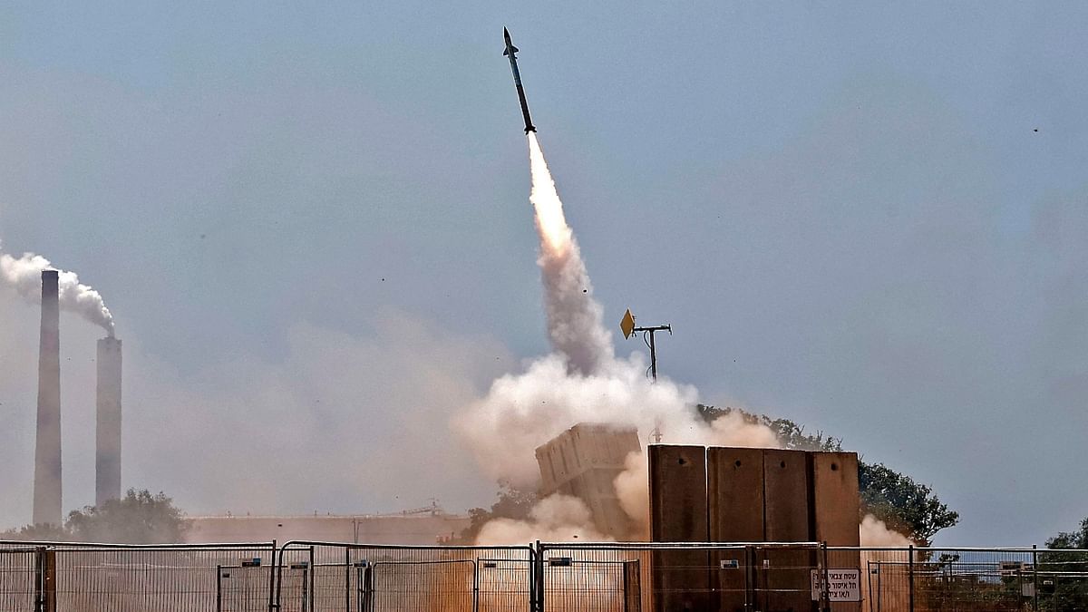 More than 300 rockets have been fired by Palestinian militants towards Israel, with over 90 per cent intercepted by its Iron Dome missile defence system, army spokesman Jonathan Conricus said. At least six Israelis have been injured. Credit: AFP