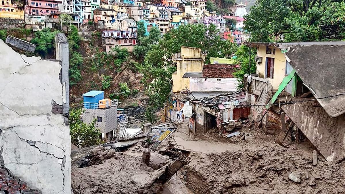 Two municipality buildings, including the multi-purpose Nagar Palika Bhawan, caved in after being hit by the rubble brought down by the cloudburst.