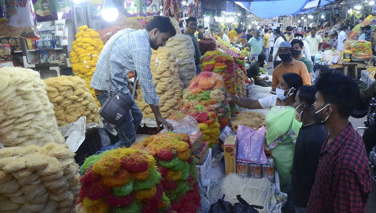 Muslims buy vermicelli and dry fruits, ahead of Eid ul-Fitr celebrations in Dibrugarh. Credit: PTI Photo