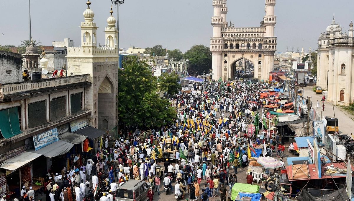 People crowd a market near the Charminar, ahead of Eid-ul-Fitr Festival, in Hyderabad. Credit: PTI Photo
