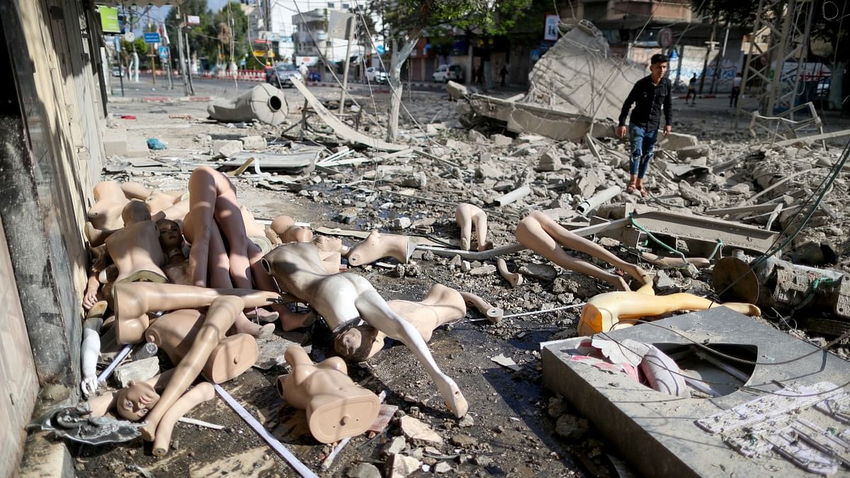 Broken mannequins are seen near the site where a tower building was destroyed by Israeli air strikes. Credit: Reuters Photo