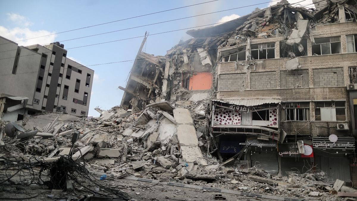 A view shows the remains of a tower building which was destroyed in the air strikes. Credit: Reuters Photo