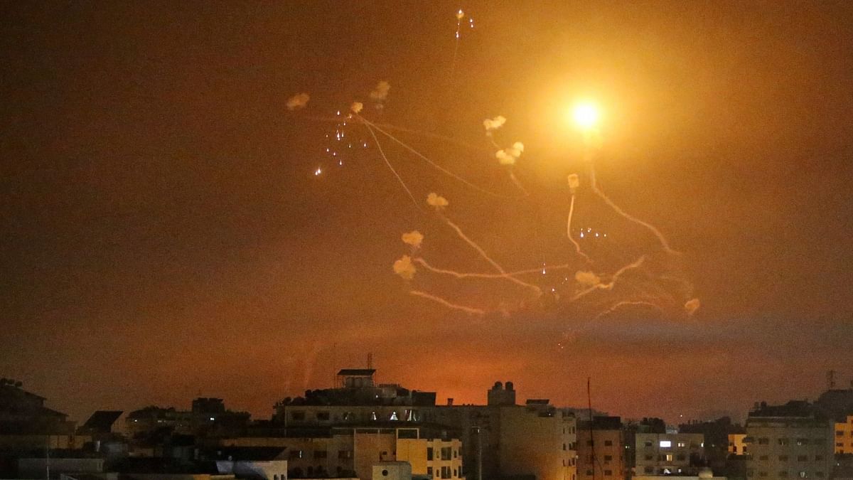 Israel's Iron Dome anti-missile system fires interceptor missiles as rockets are launched from the Gaza Strip towards Israel, in Gaza. Credit: Reuters