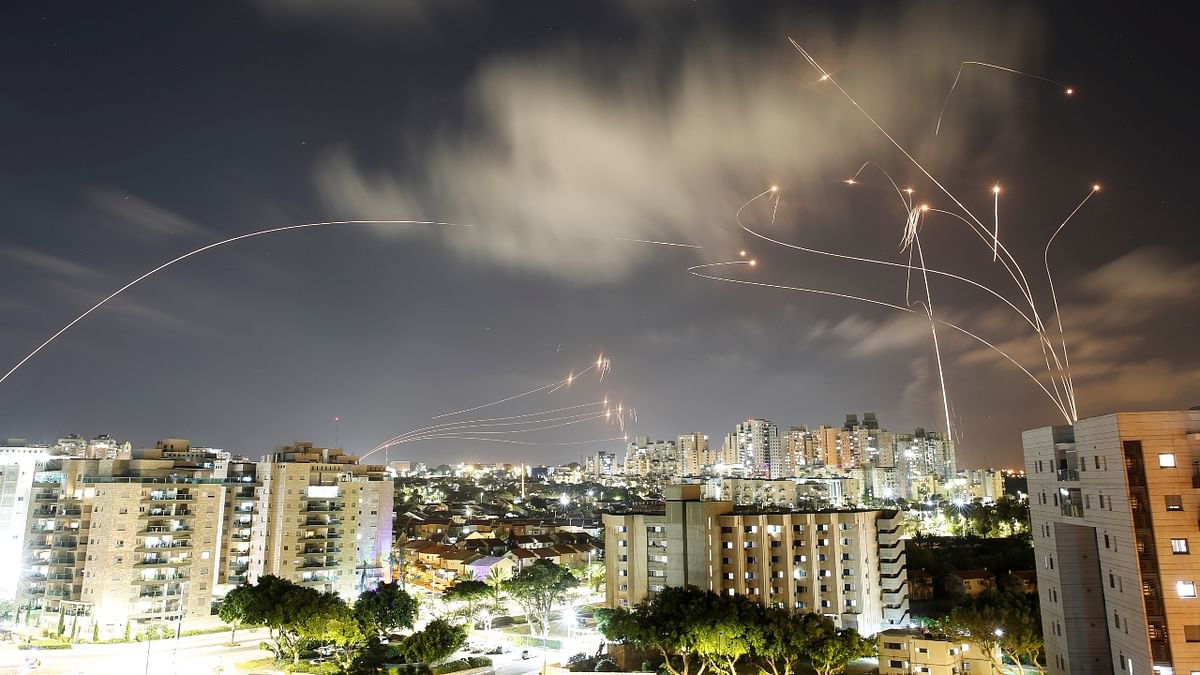 A streak of light is seen as Israel's Iron Dome anti-missile system intercepts rockets launched from the Gaza Strip towards Israel, as seen from Ashkelon, Israel. Credit: Reuters