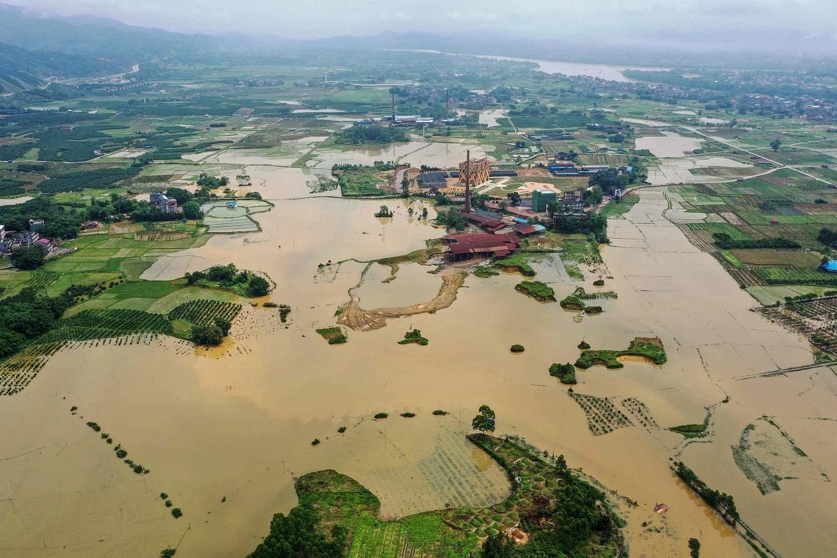 Flooded fields after heavy rains in Rongan, in China's southern Guangxi region.Credit: AFP Photo