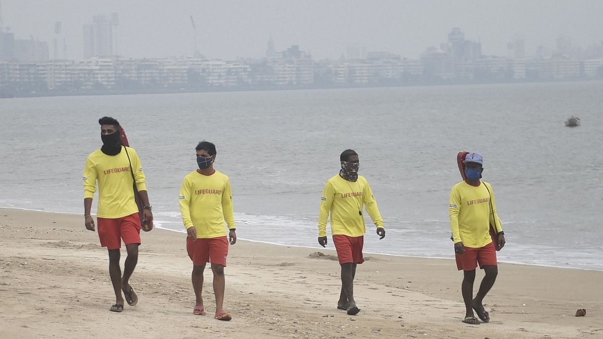Lifeguards patrol at Girgaon Chowpatty due to formation of Cyclone Tauktae in the Arabian Sea in Mumbai.