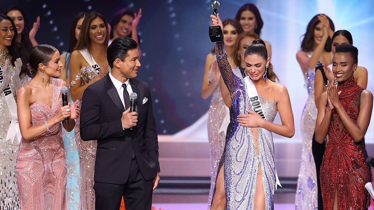 Bolivia's Lenka Nemer gets emotional while speaking on stage during the Miss Universe 2020 Pageant in Hollywood, US.