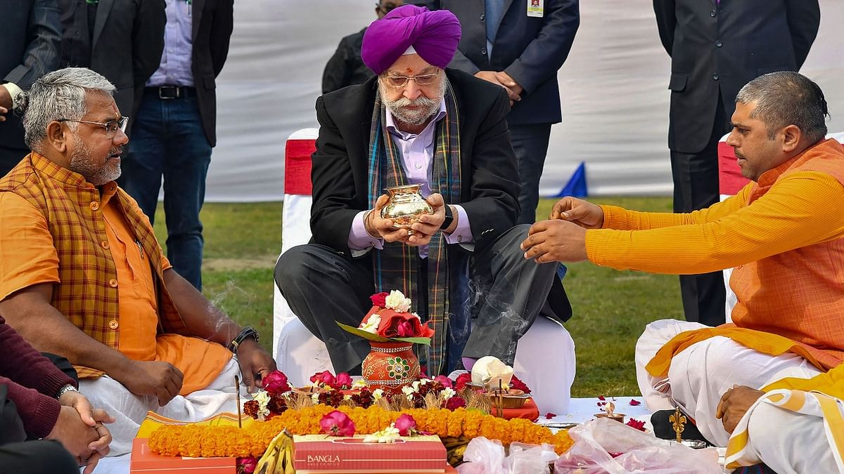 In this photo, Minister of State for Housing & Urban Affairs, Civil Aviation (Independent Charge) and Commerce & Industry Hardeep Singh Puri is seen performing 'Bhoomi Pujan' of Central Vista Avenue, at India Gate, in New Delhi.