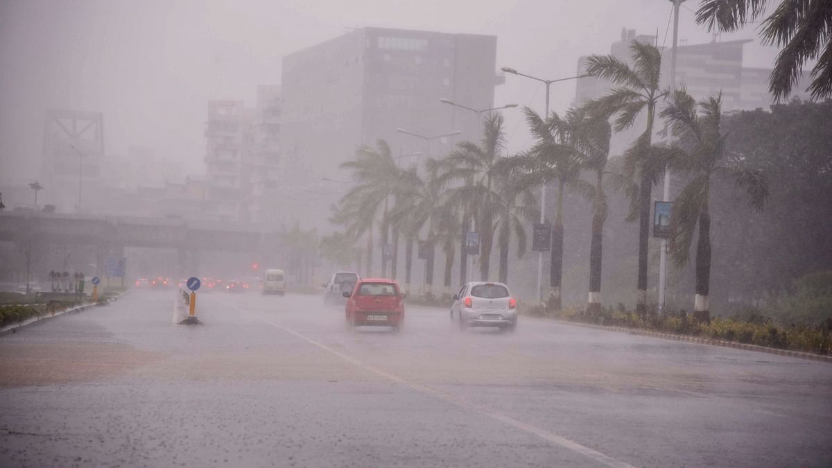 Heavy rains and gusts due to Cyclone Tauktae, near Belapur, in Navi Mumbai. Credit: PTI