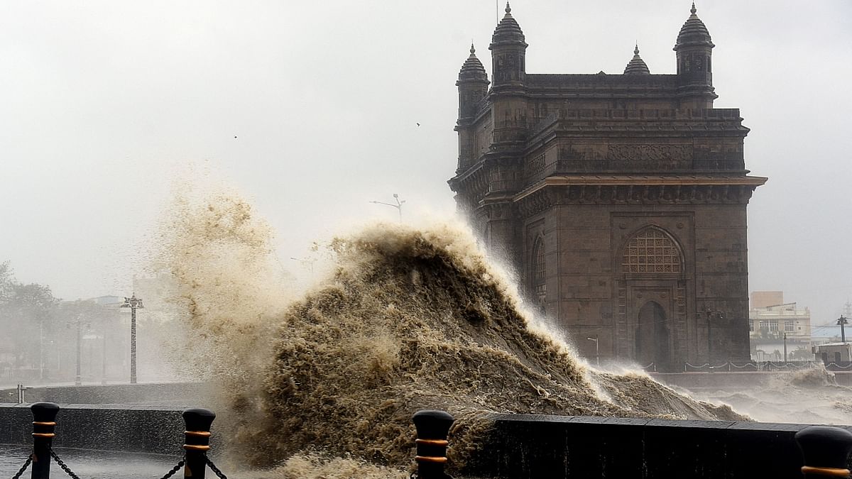 Sea waves rode the tarmac near the Gateway of India. Credit: AFP