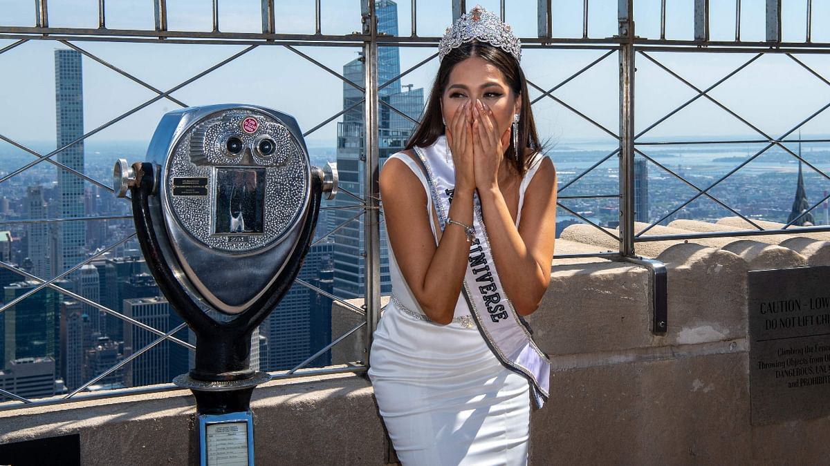 Miss Universe Andrea Meza gestures as she poses for the photographers during a photocall in the US.