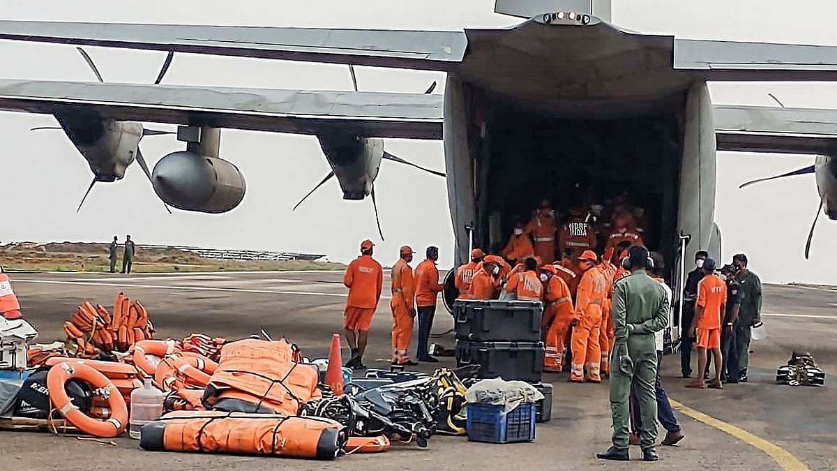 An IAF plane transports NDRF personnel to Odisha in preparedness for Cyclone Yaas. Credit: PTI