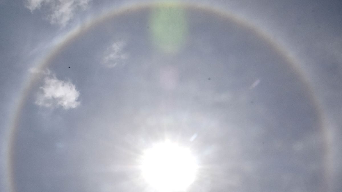 Brightening up the sky, a rainbow-coloured halo surrounding the sun was visible from most parts of the capital of Karnataka. Credit: DH Photo