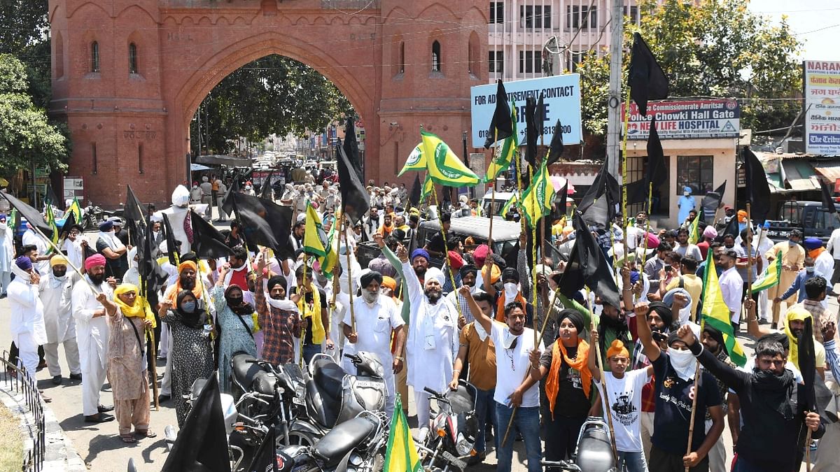 Farmers protesting against the Centre's three farm laws observed May 26 as a 'Black Day' to mark six months of the agitation. Credit: AFP Photo