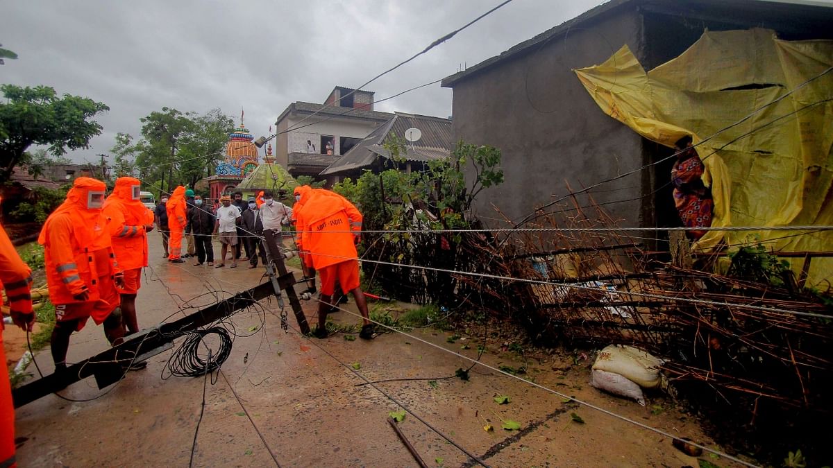 NDRF team engage in restoration work during cyclone Yaas landfall, in Balasore. Credit: PTI Photo