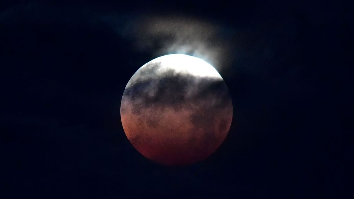 The main event will be between 1111-1125 GMT -- late evening in Sydney and pre-dawn in Los Angeles -- when the Moon will be entirely in the Earth's shadow. Credit: PTI Photo