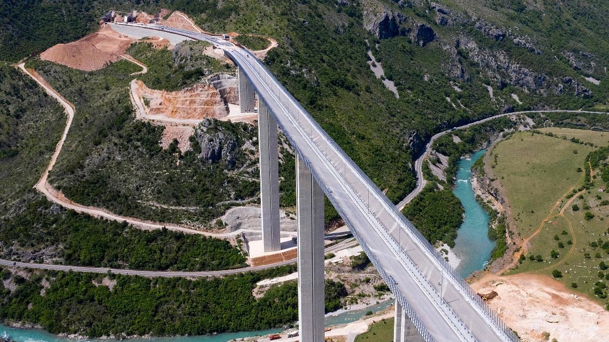 An aerial views shows a part of the new highway connecting the city of Bar on Montenegro’s Adriatic coast to landlocked neighbour Serbia, (Bar-Boljare highway) on May 11, 2021, near Matesevo, which is being constructed by China Road and Bridge Corporation (CRBC), the large state-owned Chinese company. Credit: AFP Photo
