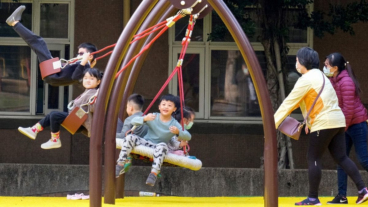 In this photo taken on January 26, 2021, Taipei Municipal Laosong Elementary School students play at school in Taipei. - Few places have experienced quite as profound a demographic change as Taiwan, with the average Taiwanese woman in 1951 giving birth to seven children, now it is less than one. Credit: AFP Photo